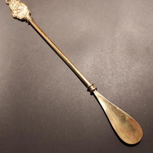 Vintage long 15 inches ( 38 centimeters) brass shoe horn. Old brass shoe horn, for vintage decor in your home, for collection, for gift