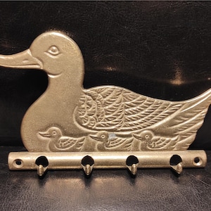 Ducks brass - Vintage brass hanger for clothes or towels/ Vintage wall key holder made of brass with the image of geese
