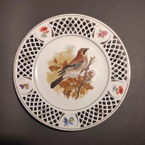 Vintage German porcelain openwork decorative wall plate with bird pattern - Porcelain perforated plate with bird
