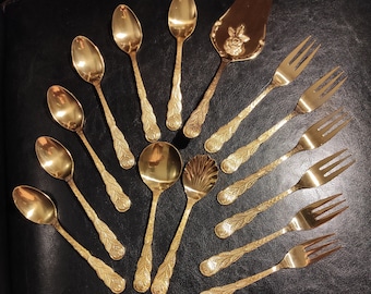 Vintage gold colored cutlery set consisting of vintage dessert spoons, forks and cake lifter-Vintage German gold cutlery set with roses