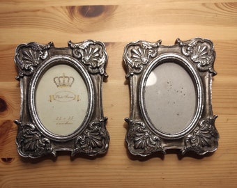 Set of two vintage silver photo frames made of heavy plastic