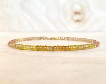 Hammered Disk Curff Bracelet with Reconstituted Turquoise 14k gold-plated Hammered Disk Curff Bracelet with Reconstituted Turquoise 14k gold-plated