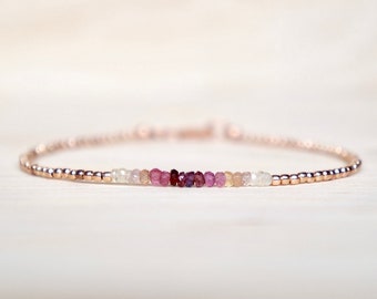 Jewels gemstones pearls in silver 925 rose gold and gradient of beige pink sapphires, fine handcrafted bracelet minimalist style