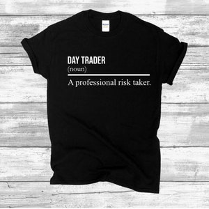 May include: Black t-shirt with white text that reads "DAY TRADER (noun) A professional risk taker."