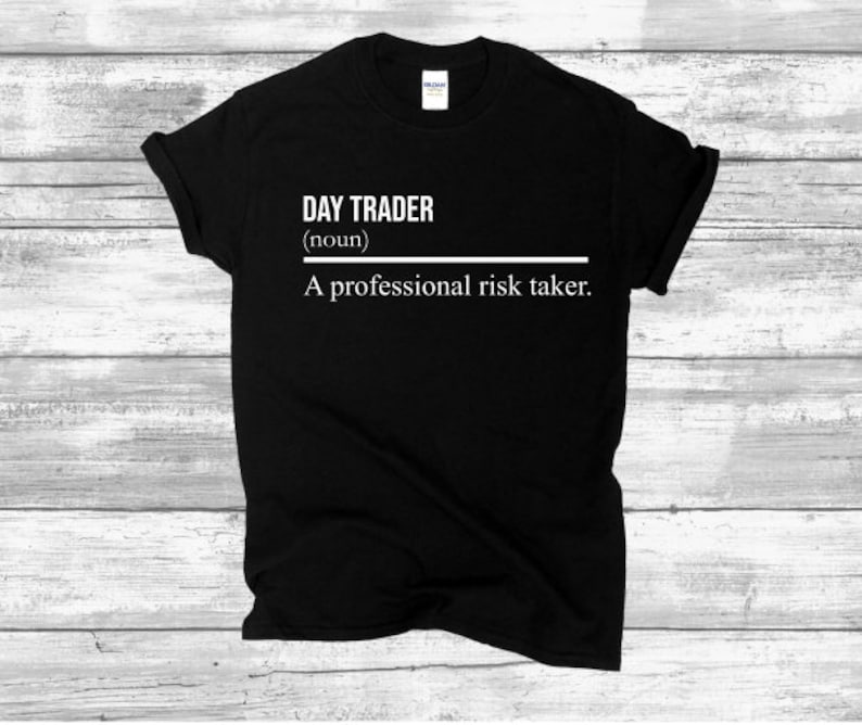 May include: Black t-shirt with white text that reads "DAY TRADER (noun) A professional risk taker."