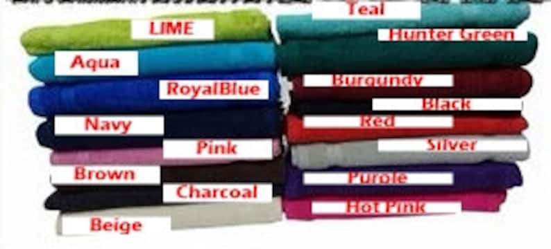 May include: A collection of folded rectangular towels in various colors including lime, aqua, royal blue, navy, pink, brown, charcoal, beige, teal, hunter green, burgundy, black, red, silver, purple, and hot pink, each labeled with its color name.