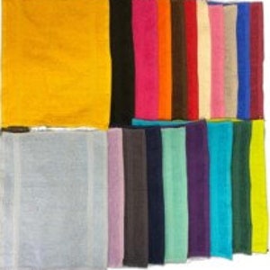 May include: A collection of rectangular fabric swatches in a wide variety of solid colors including yellow, black, pink, orange, brown, red, cream, light pink, beige, blue, maroon, gray, lavender, charcoal, navy, mint, purple, teal, dark green, and lime.