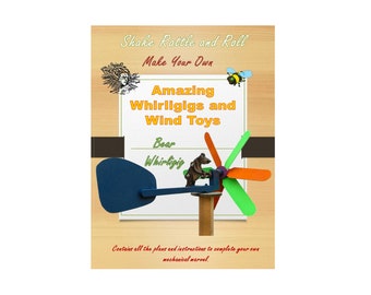 May include: A book cover with a wooden background and the title "Shake Rattle and Roll Make Your Own Amazing Whirligigs and Wind Toys". The cover features a colourful whirligig with a bear figure and the text "Bear Whirligig".
