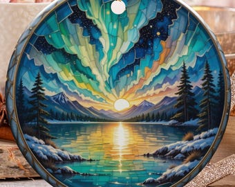 May include: Round Christmas ornament with a landscape painting of a lake, mountains, and aurora borealis. The ornament has a gold string for hanging. Other holiday decorations include candy canes, a star, and a gold ornament.