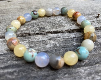 Pulsera bendecida con Reiki Crazy Blue Honey: Crazy Lace Agate, Blue Chalcedony, Honey Calcite, Aqua Terra Jasper