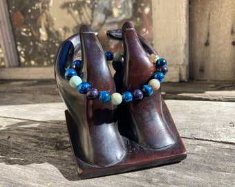 Ocean Eyes Reiki-Blessed Bracelet: Blue Tigers Eye, Blue Goldstone, Aqua Terra Jasper, Dark Blue Iridescent Glass