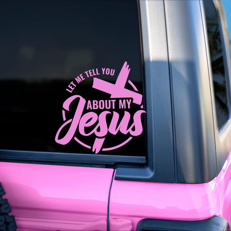 May include: Pink vinyl decal with a cross and the text "Let me tell you about my Jesus".