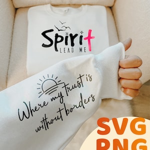 Puede incluir: Sudadera blanca con las palabras "Spirit Lead Me" en negro y rosa, con pájaros y estrellas. La manga muestra el texto "Where my trust is without borders" con un sol. La imagen también incluye "SVG PNG Instant Download".