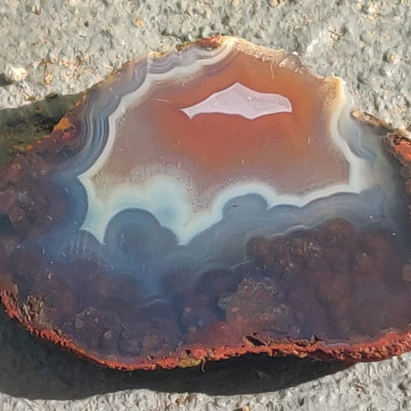 End Cut 1/2 Nodule of a Small Coyomito Agate, with Wonderful Warm Colors, Shadows, Fortification Lines| 1/2 of the Nodule Buffed