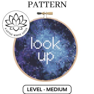 May include: Cross stitch pattern featuring a galaxy background with the words "look up" in white text. The pattern is labeled as "Level - Medium" and is a digital download product compatible with Pattern Keeper software.