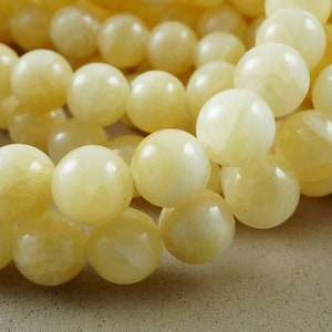 Yellow Calcite Beads (Round)(Smooth)(6mm)(8mm)(16"Strand)