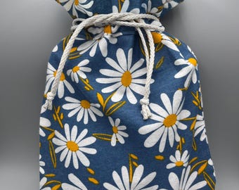 Hot water bottle covers in cotton flannel with lining inside.