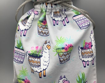 Hot water bottle covers in cotton flannel with lining inside.