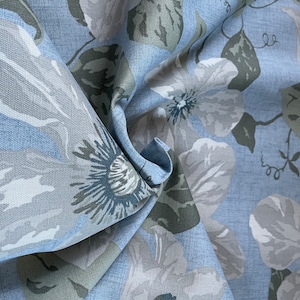 Hibiscus Light Blue Floral Decorating Fabric, Draperies, Curtains, Pillows, etc.  Nice thick fabric with a linen look without the wrinkles.