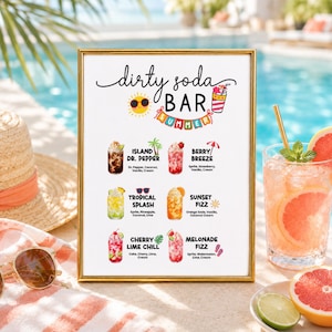 May include: A framed sign titled Dirty Soda Bar Summer featuring illustrations of six drinks with names and ingredients: Island Dr. Pepper, Berry Breeze, Tropical Splash, Sunset Fizz, Cherry Lime Chill, and Melonade Fizz, with colorful icons.
