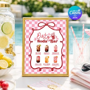 May include: A gold-framed sign with a pink and white checkered background featuring the text Dirty Soda Bar and illustrations of six different drinks with labels including Baby Mama, Diaper Duty, Doddin Bottles, Ready to Pop, and Sip Sip Hooray.