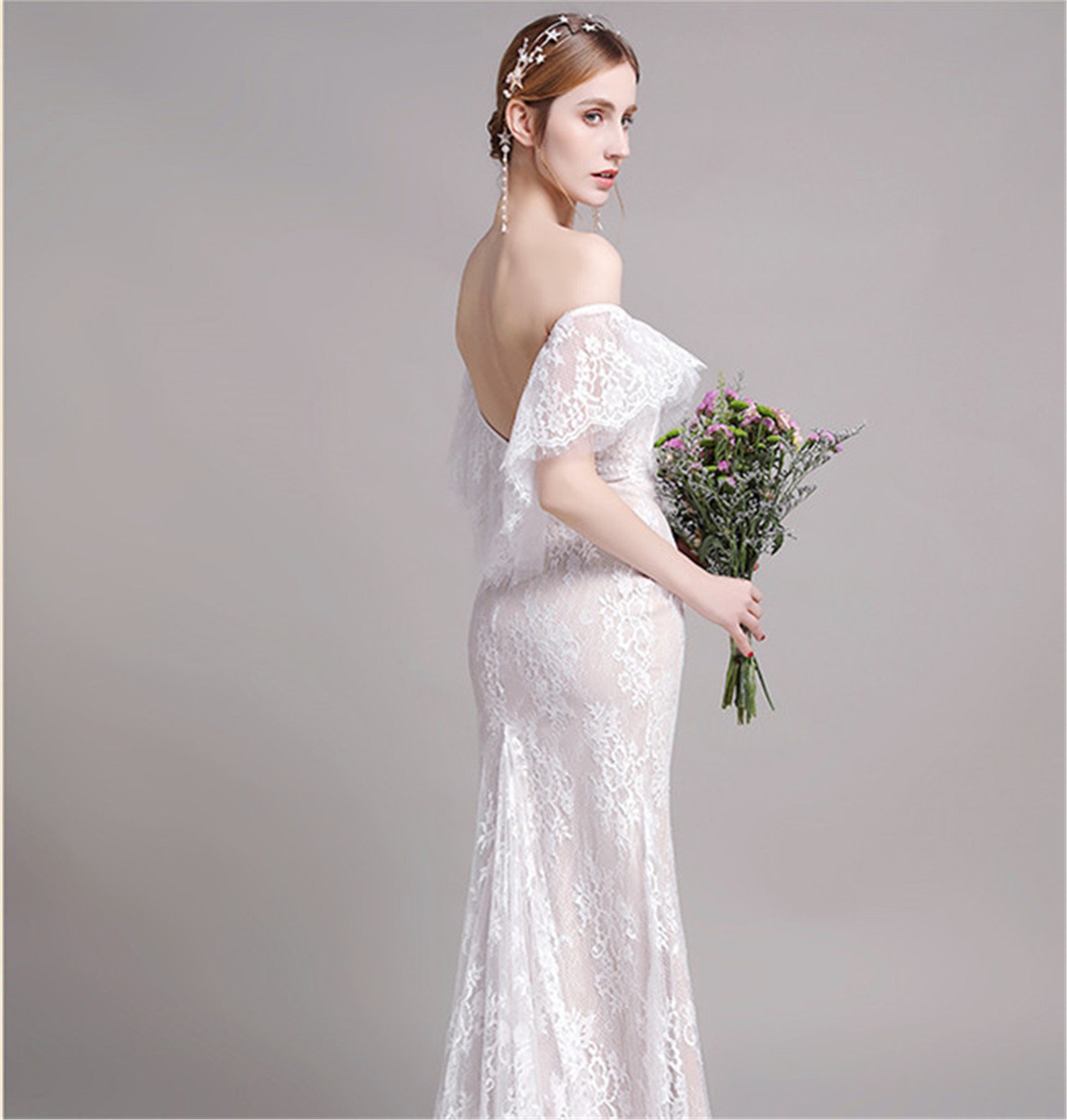 gown with ruffle sleeves
