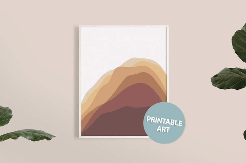 Puede incluir: Impresi&oacute;n art&iacute;stica enmarcada con un dise&ntilde;o abstracto de formas curvas en capas en tonos marr&oacute;n, beige y burdeos sobre un fondo blanco. La impresi&oacute;n est&aacute; etiquetada como "Printable Art" en un c&iacute;rculo azul claro.