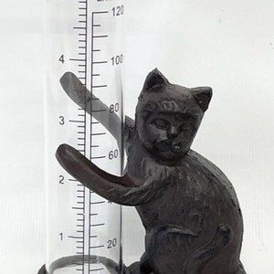 Cat table top rain gauge