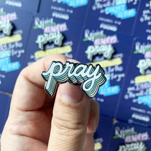 PRAY enamel pin