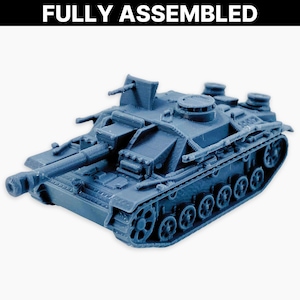 StuH 42 (vroege rails), volledig gemonteerd: Duitse Sturmhaubitze 42-aanvalshouwitser uit WO II met railpantser, vroege variant, Wargaming-miniatuur