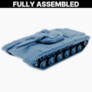 May include: A light blue toy tank, fully assembled, with a prominent gun barrel and detailed track wheels. The text "FULLY ASSEMBLED" is displayed in bold white letters at the top of the image. The tank is a miniature replica.