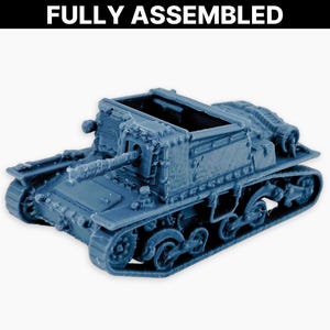 May include: A fully assembled, blue model tank with a detailed design. The tank features a long barrel, tracks, and a rectangular open top. The text "FULLY ASSEMBLED" is displayed above the tank.