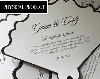 May include: White and black wedding invitation cards with scalloped edges. The cards feature elegant script with the names "Gaige & Carly" and the date "07.12.2025". A black ribbon is visible. The text "PHYSICAL PRODUCT" is also present.