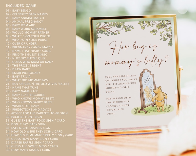 May include: A Winnie the Pooh-themed baby shower game card with a pink background and a gold frame. The card features a cartoon illustration of Winnie the Pooh looking in a mirror. The text on the card reads "How big is mommy's belly?" and includes instructions for a game where guests guess the size of the expectant mother's belly.