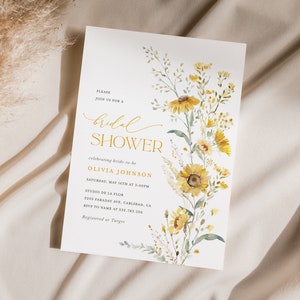 May include: A white bridal shower invitation with a watercolor illustration of yellow wildflowers. The text reads "Please join us for a bridal shower celebrating bride-to-be Olivia Johnson, Saturday, May 16th at 3:00pm, Studio de la Flor, 2005 Faraday Ave, Carlsbad, CA, RSVP to name at 552-783-296, Registered at Target."