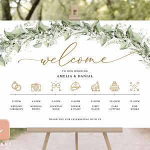 May include: A wedding welcome sign with a green leafy garland and gold lettering. The sign lists the wedding ceremony, photo, cocktail hour, dinner and toast, first dance, cake cutting, and fireworks. The text reads "Welcome to our wedding Amelia & Danial".