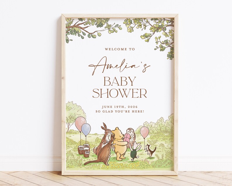 Puede incluir: Una invitaci&oacute;n a una baby shower con tem&aacute;tica de Winnie the Pooh con una ilustraci&oacute;n de acuarela de Winnie the Pooh y sus amigos. El texto dice "Bienvenido a la baby shower de Amelia 19 de junio de 2026 &iexcl;Encantados de que est&eacute;s aqu&iacute;!"