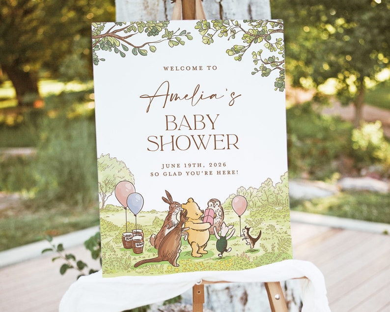 Puede incluir: Una invitaci&oacute;n a una fiesta de bienvenida al beb&eacute; con tem&aacute;tica de Winnie the Pooh con fondo blanco y follaje verde. El texto dice "Bienvenido a la fiesta de bienvenida al beb&eacute; de Amelia el 19 de junio de 2026. &iexcl;Estamos encantados de que est&eacute;s aqu&iacute;!" La ilustraci&oacute;n presenta a Winnie the Pooh, Piglet, Eeyore, Tigger y Owl.