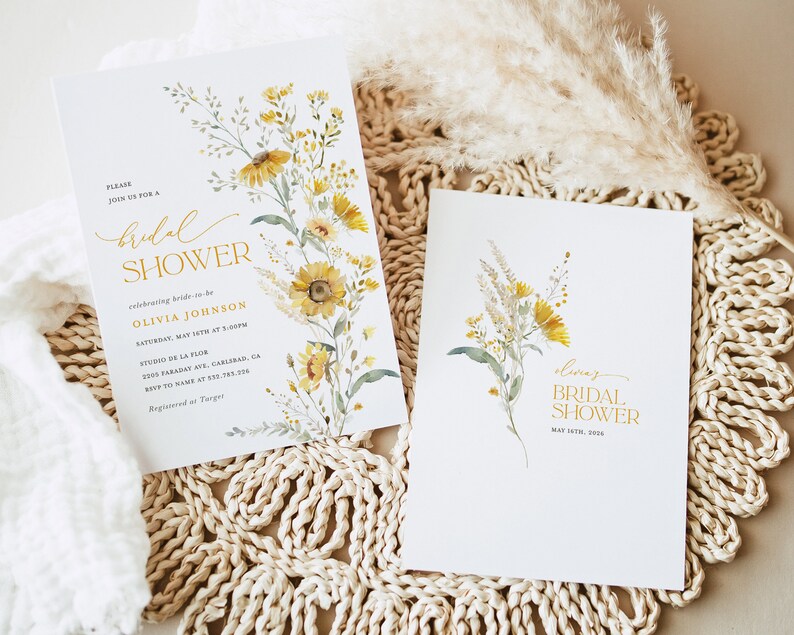 May include: Two bridal shower invitations with a watercolor floral design featuring yellow flowers and green leaves. The text on the invitations reads "bridal shower" and includes the bride-to-be's name, date, time, and location.