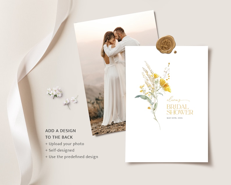 May include: A white card with a watercolor illustration of yellow flowers and green leaves. The text "lioraz BRIDAL SHOWER MAY 14TH, 20" is printed in gold lettering.