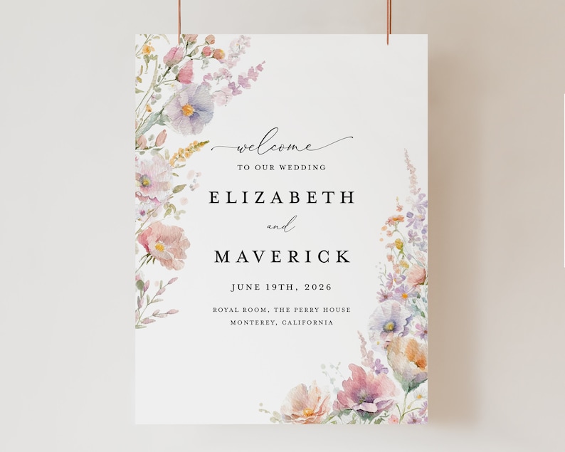 May include: A wedding welcome sign with watercolor floral designs in shades of pink, purple, and green. The text reads "Welcome to our wedding, Elizabeth and Maverick, June 19th, 2026, Royal Room, The Perry House, Monterey, California."