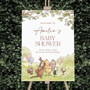 Puede incluir: Un cartel de bienvenida para una baby shower con tem&aacute;tica de Winnie the Pooh con fondo blanco y follaje verde. El cartel dice "Bienvenido a la Baby Shower de Amelia 19 de junio de 2026 &iexcl;Encantados de que est&eacute;s aqu&iacute;!" y presenta a Winnie the Pooh, Piglet, Tigger, Eeyore, Owl y Rabbit.