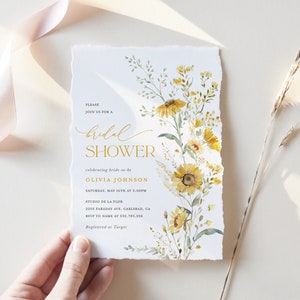May include: A yellow and green floral bridal shower invitation with the text "PLEASE JOIN US FOR A bridal SHOWER celebrating bride-to-be OLIVIA JOHNSON SATURDAY, MAY 16TH AT 3:00PM STUDIO DE LA FLOR 2205 FARADAY AVE, GARLSBAD, CA RSVP TO NAME AT 532.783.226 Registered at Target"