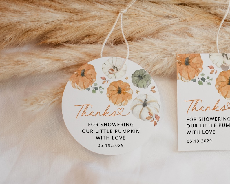 May include: Round white thank you tag with a watercolor design of pumpkins and fall leaves. The tag says "Thanks for showering our little pumpkin with love 05.19.2029".