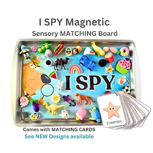 May include: A sensory matching board game with the text "I SPY Magnetic Sensory MATCHING Board". The board features various colourful magnetic objects, including food, animals, and shapes. Matching cards are included, with a starfish card visible.