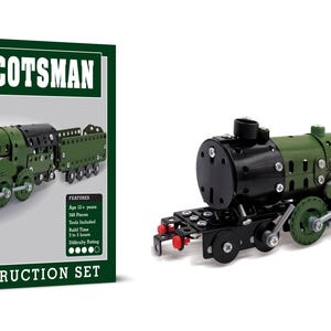 May include: A metal construction kit of the Flying Scotsman train. The model train is green and black, with silver wheels and connecting rods. The box is green with the words "FLYING SCOTSMAN" and "METAL CONSTRUCTION SET".