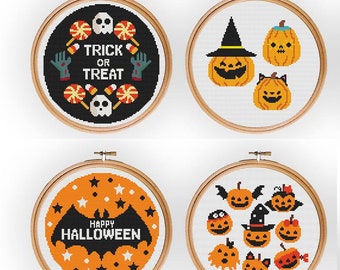 May include: Four embroidery hoop designs featuring Halloween themes. The first hoop has a black background with a skull, candy corn, and the text "Trick or Treat". The second hoop has a white background with three orange pumpkins, one wearing a witch's hat. The third hoop has an orange background with a black bat and the text "Happy Halloween". The fourth hoop has a white background with seven orange pumpkins, some wearing hats and others with eyes.