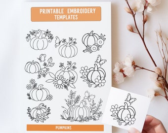 May include: Printable embroidery templates featuring nine different pumpkin designs with floral and butterfly accents. The designs are black and white and labeled "Pumpkins".