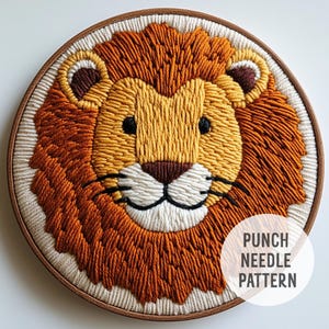 May include: A punch needle pattern for a lion's face. The lion has a brown mane, a yellow face, and a white nose. The pattern is on a white background with the text "Punch Needle Pattern" in black.