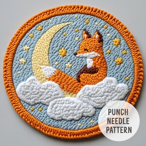 May include: Punch needle pattern featuring a fox curled up on a cloud with a crescent moon and stars in the background. The pattern is worked in orange, yellow, white, and blue yarn.